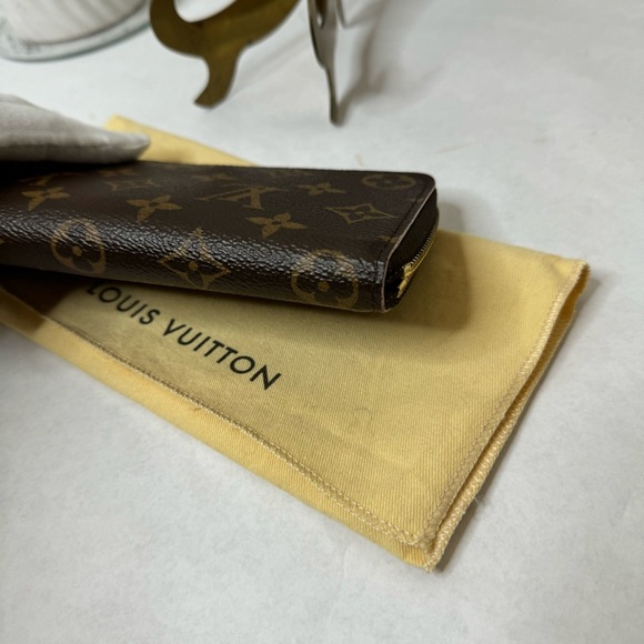 LOUIS VUITTON Monogram Canvas
Clemence Flower Charm Zippy Wallet - Picture 7 of 14
